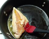 A picture of step 2 of Seasoned, buttered boneless skinless chicken breast..