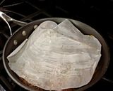 A picture of step 4 of Lemon Herb Butter Poached Chicken Breasts.