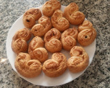 Foto del paso 13 de la receta: Palmeritas de hojaldre con azúcar, coco rallado y pasas