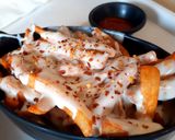 A picture of step 5 of Cheesy peri peri fries 🍟.