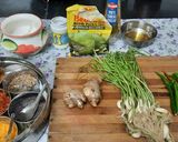A picture of step 1 of Green garlic, green chilli ginger pickle.