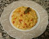 Foto del paso 4 de la receta Merluza con calabacín y pimientos rojos a la bechamel
