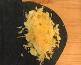 A picture of step 1 of Chilli Chicken Cheese and Egg Wraps.