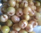 A picture of step 1 of Gujarati style Ripe Gumberry sabzi.