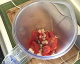 Foto del passaggio 4 della ricetta Spaghetti di calamaro con crema di finocchio e frullato di datterini piccante