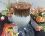 A picture of step 4 of Dalgona coffee with coffee mate.