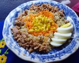 Foto del paso 3 de la receta: Ensalada de arroz yamaní con atún ahumado, zanahorias, choclo y huevo