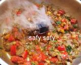 A picture of step 3 of Foul Medames with Charcoal.