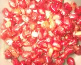 A picture of step 1 of Pomegranate and Orange smoothy.