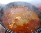 Foto del paso 4 de la receta: Arroz con pollo y caracoles