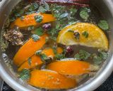 A picture of step 1 of Cranberry Orange Tea - Immunity Tea for post Party Detox.