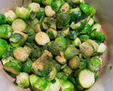 A picture of step 1 of Apple juice braised Brussels sprouts with bacon.