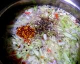 A picture of step 3 of Mix veggies and chicken soup.