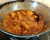 A picture of step 9 of Onion Tomato Chicken.