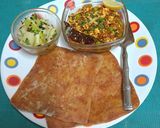 A picture of step 11 of An Indian Bento Box --- Ajwain Paratha 🫓, Paneer Bhurji 🫛🪅 & A Simple Cucumber Salad 🥒🥒.