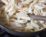 A picture of step 8 of White Sauce Penne pasta.