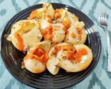Foto del paso 6 de la receta: Lumacomis rellenos de mozzarella gratinados con queso azul
