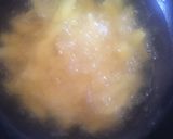 A picture of step 2 of Irish potatoes and sauce.