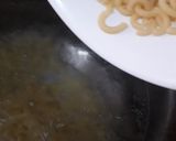 A picture of step 1 of Chicken tikka microni with spicy spaghetti.