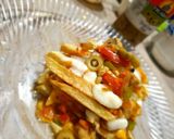 A picture of step 7 of Fries cottage with cheese.