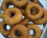 A picture of step 6 of Donuts.