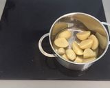 A picture of step 1 of Vegetarian Roast Potatoes 🥔.