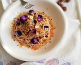 Foto del passaggio 10 della ricetta Spaghetti profumati all' arancia con violette eduli
