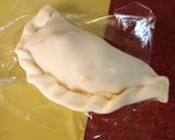 A picture of step 2 of Pizza Roll Empanadas.