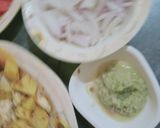 A picture of step 3 of Achari aloo gobhi.