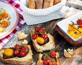 A picture of step 4 of Crostoni with Figs and Confit Cherry Tomatoes.
