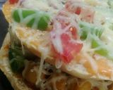 A picture of step 17 of Double decker Chole Pizza.