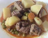 Foto del paso 9 de la receta Guiso de ternera con patatas, zanahoria y guisantes rápido