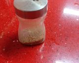 A picture of step 3 of Spnich rabdi with peanuts & Chocolate balls.