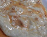 A picture of step 2 of Anday wali tawa cooked roti.