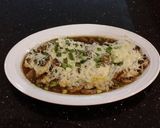 A picture of step 9 of Chicken Lombardy.