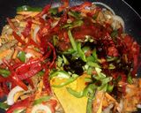 A picture of step 2 of Singapore noodles/ rice sticks.