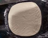 A picture of step 2 of Pizza Wheel Buns.