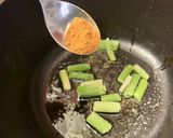Foto del paso 3 de la receta: Potaje de garbanzos con embutido valenciano, cebolla y espinacas