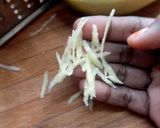 A picture of step 1 of Mamidikaya pulihora or mavinakayi chitrana / Mango rice.