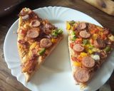 A picture of step 7 of Smokie pizza.