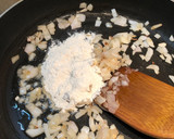 A picture of step 7 of Baked Spiced potato wedges with garlic Bechamel sauce.