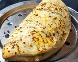 A picture of step 3 of Stuffed Garlic Bread 😋😋.