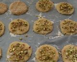 A picture of step 5 of Barazek (Pistachios and sesame cookies).