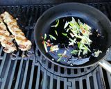 A picture of step 4 of Asian style pork kebabs, steamed veg and yellow rice.