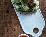A picture of step 5 of Mexican Rice Rolls.