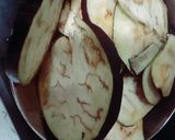 A picture of step 3 of Tawa fry bengan.