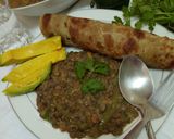 A picture of step 8 of Spicy lentils (kamande)in milk and cinnamon raisins chapati.