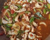 Foto langkah ke 4 dari resep Oseng Cumi Petai Pedas.