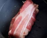 A picture of step 6 of Bacon Wrapped around Chicken breast with soft Smoked Cheese 🤩.