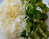 Foto del paso 2 de la receta: Arroz caldoso con bacalao, alcachofas y habas